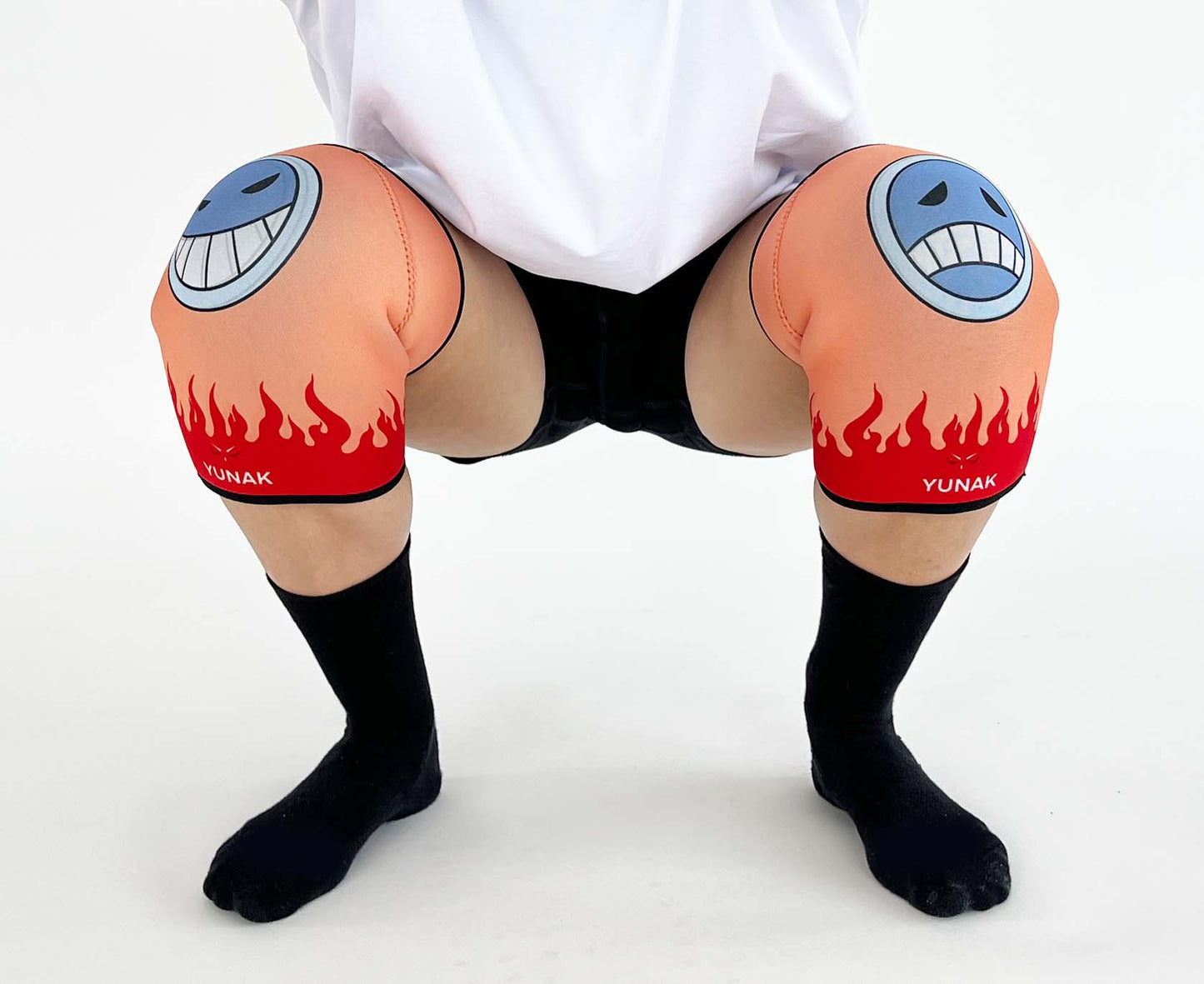 7mm thick knee sleeves inspired by Ace from One Piece. Anime knee sleeves for the gym with Ace anime design for weightlifting