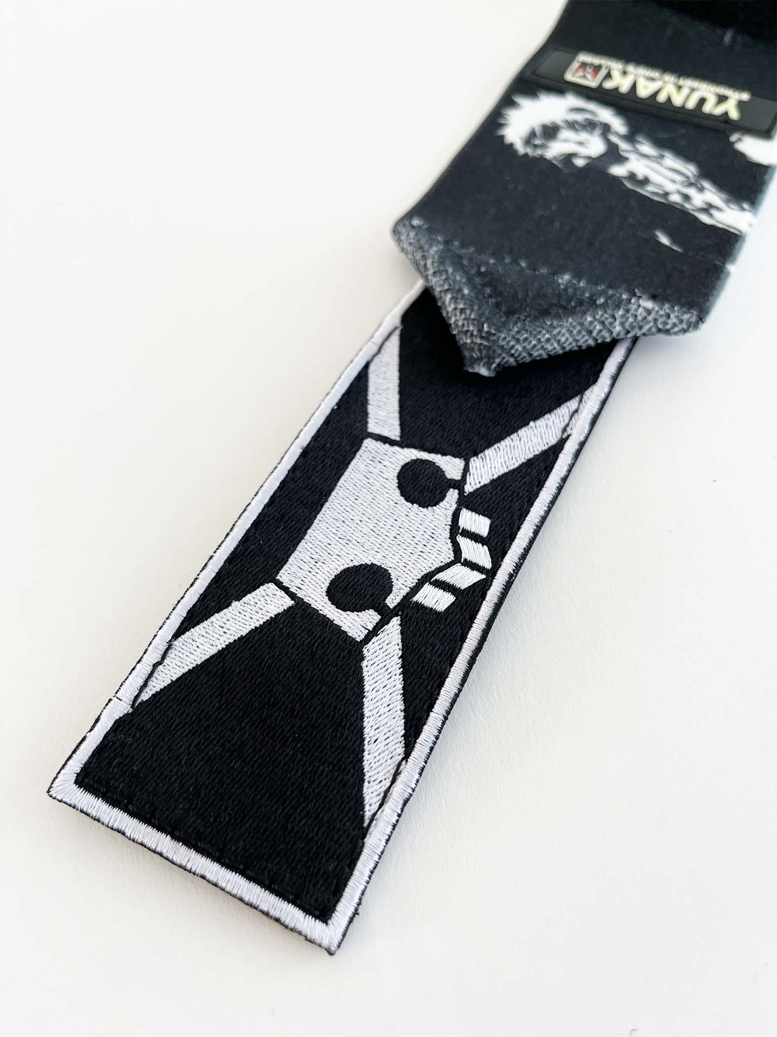 Embroidered anime wrist wraps inspired by Ichigo from Bleach. Anime lifting wraps for the gym