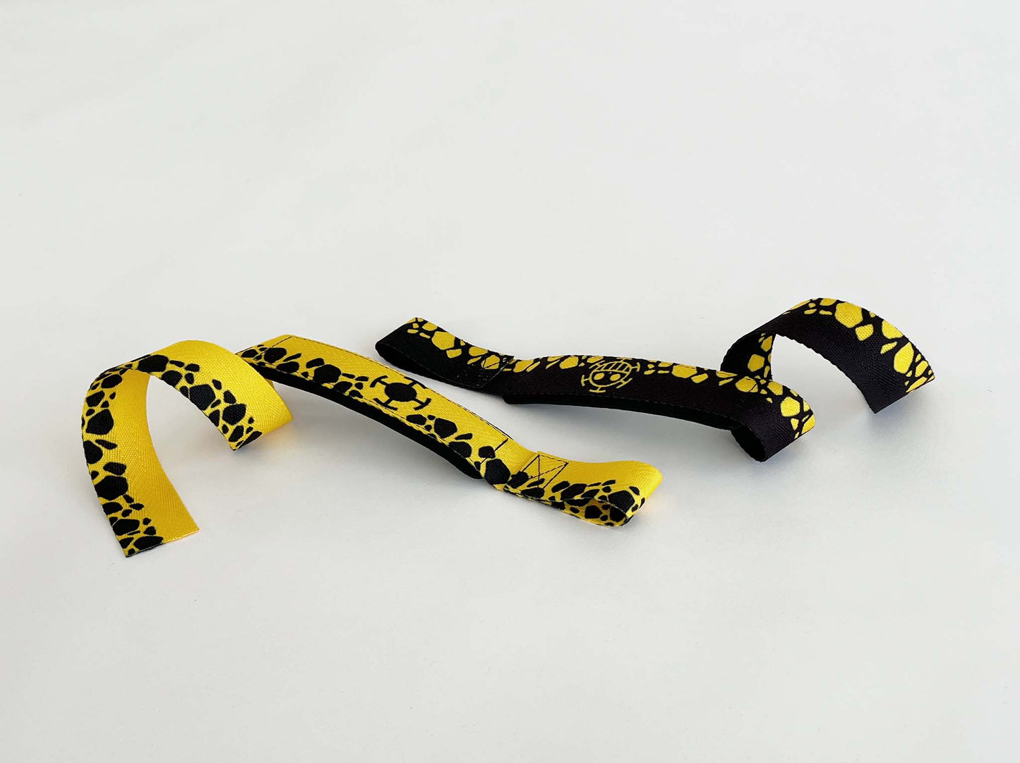 Anime lifting straps inspired by Trafalgar Law from One Piece. Anime lifting gear for the gym