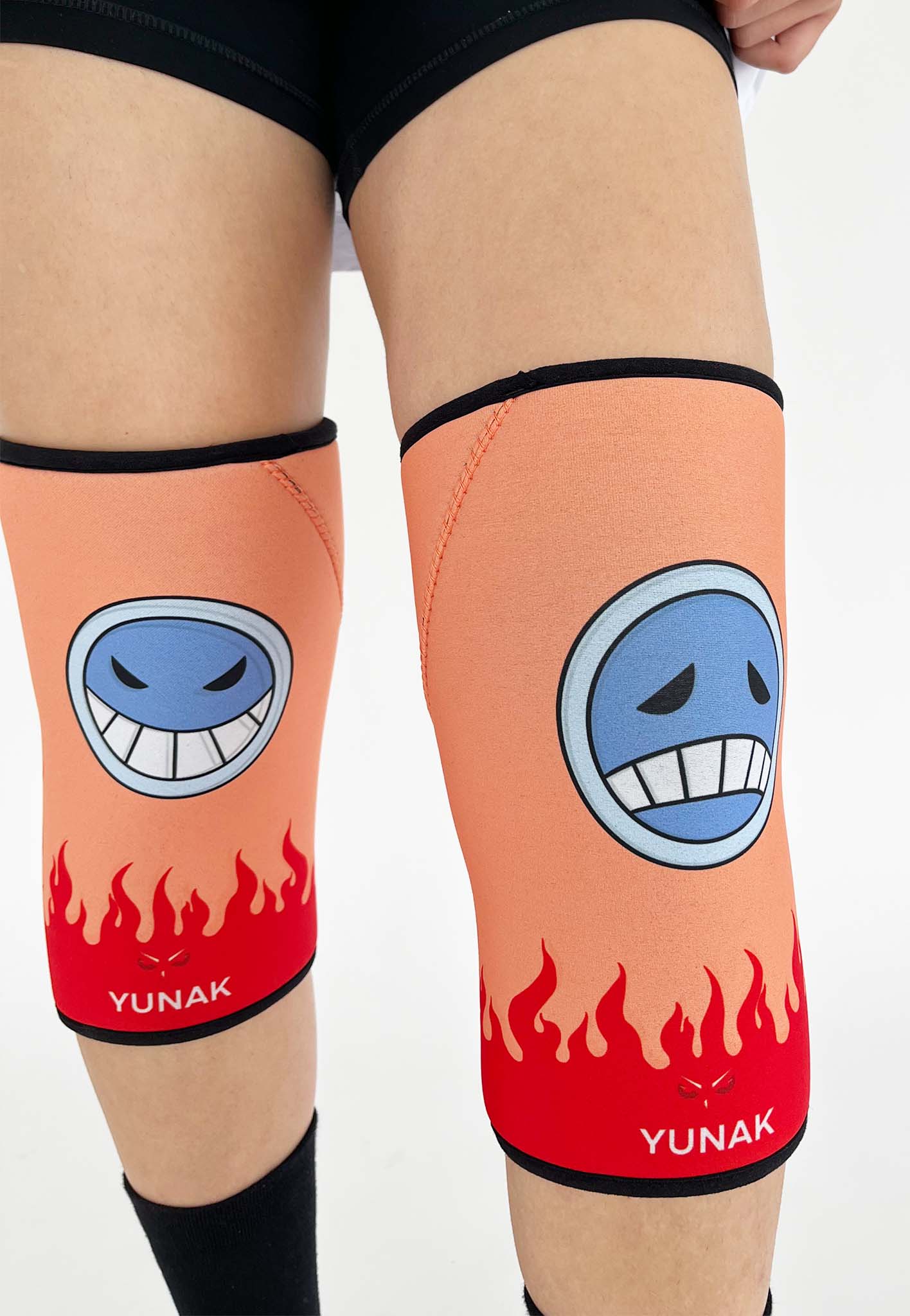 7mm thick knee sleeves inspired by Ace from One Piece. Anime knee sleeves for the gym with Ace anime design for weightlifting