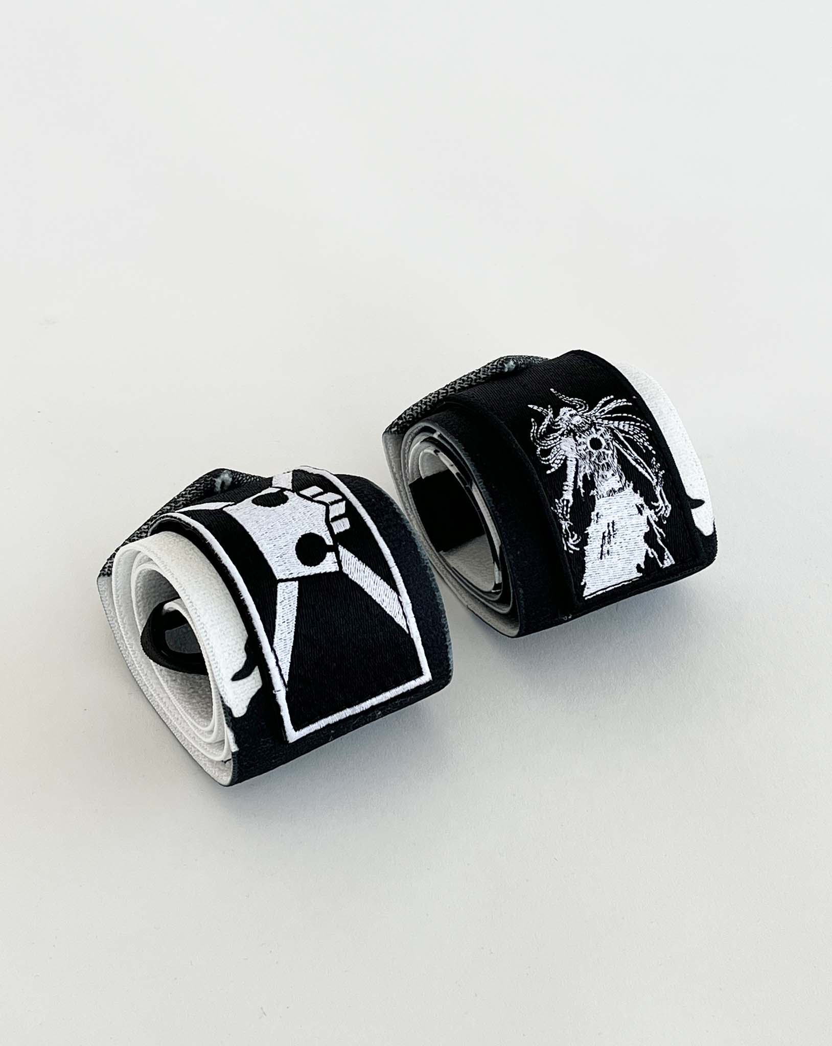 Embroidered anime wrist wraps inspired by Ichigo from Bleach. Anime lifting wraps for the gym