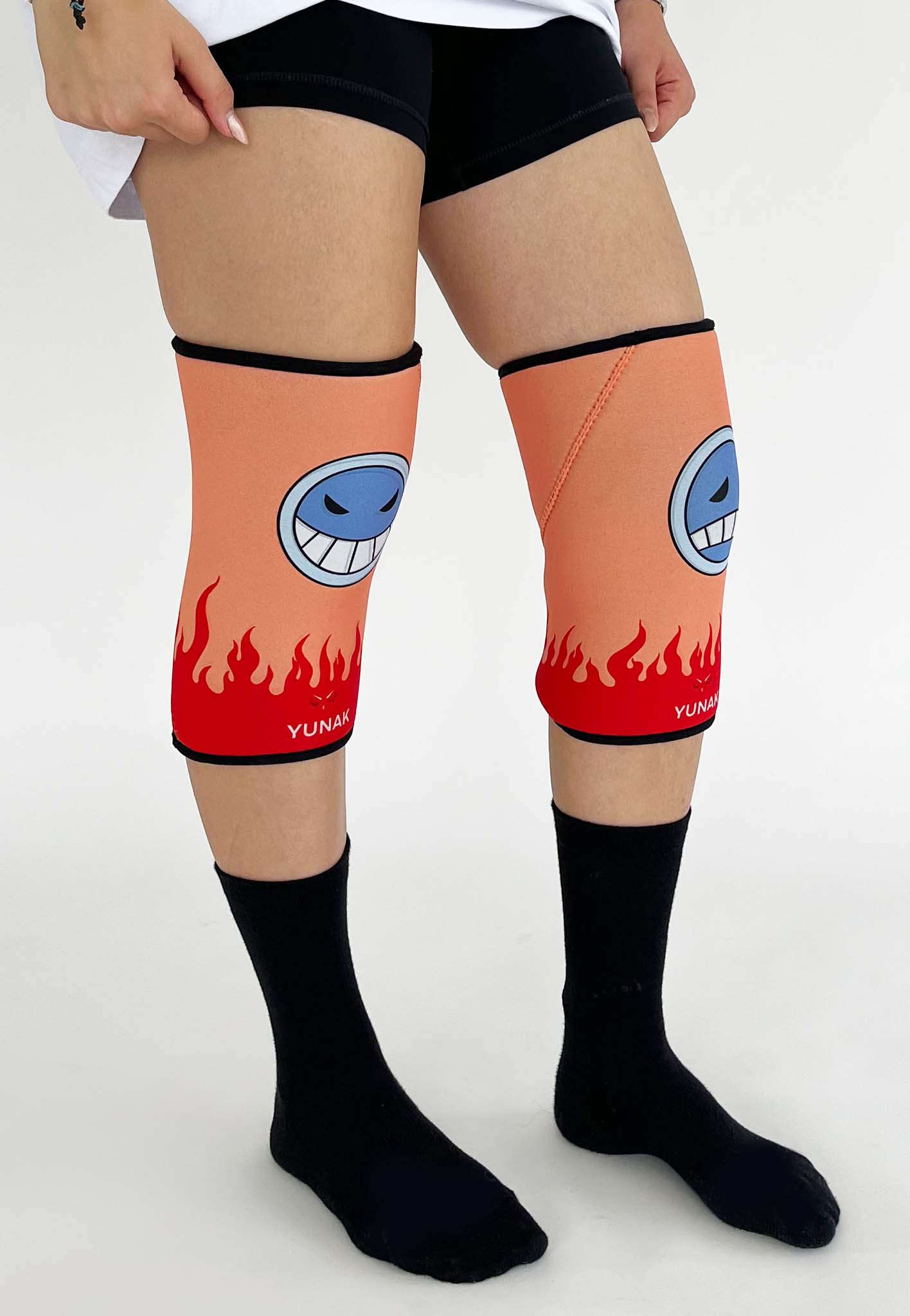 7mm thick knee sleeves inspired by Ace from One Piece. Anime knee sleeves for the gym with Ace anime design for weightlifting