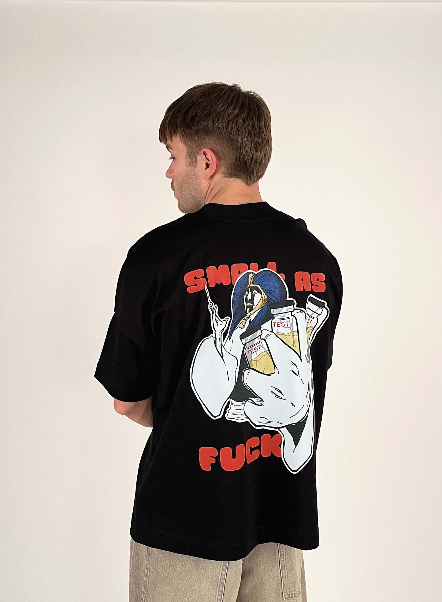 An oversized tshirt inspired by Mayuri from Bleach. Anime Pump Cover for the gym with Small as F text and Mayuri from Bleach. Male model back design