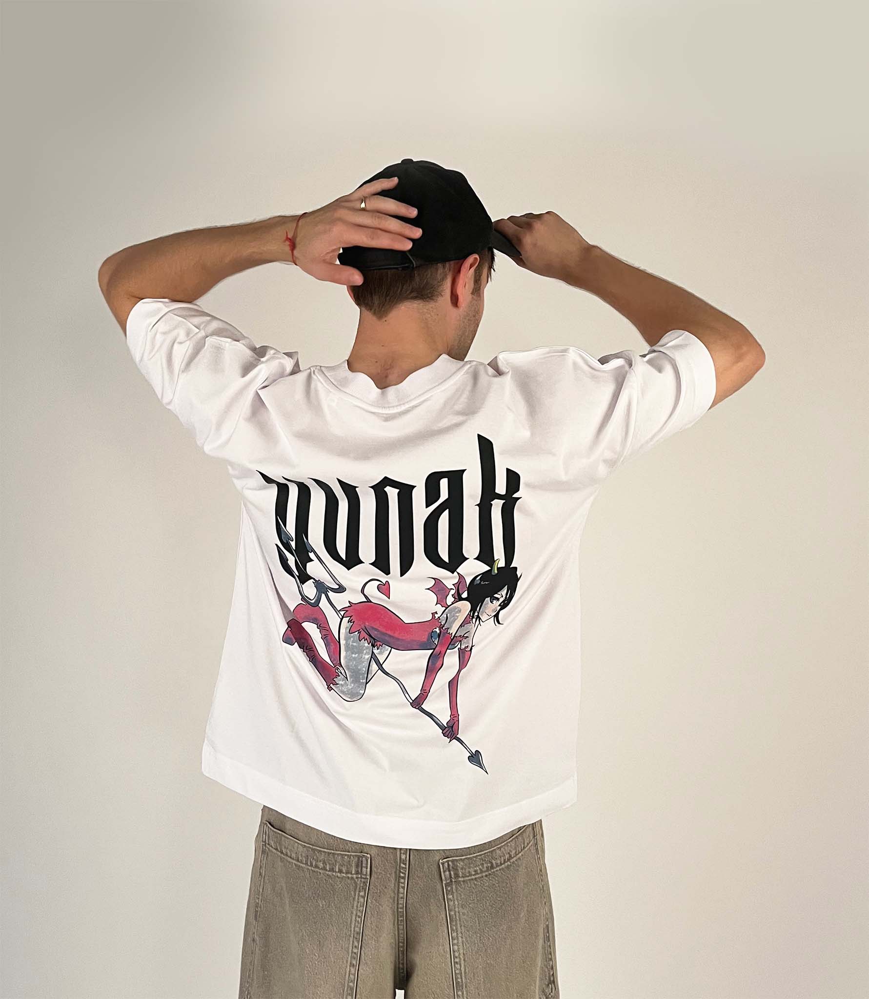 An oversized tshirt inspired by Rukia from Bleach. Anime Pump Cover for the gym with Yunak text and Rukia drawn as a demon from Bleach. Male model back design