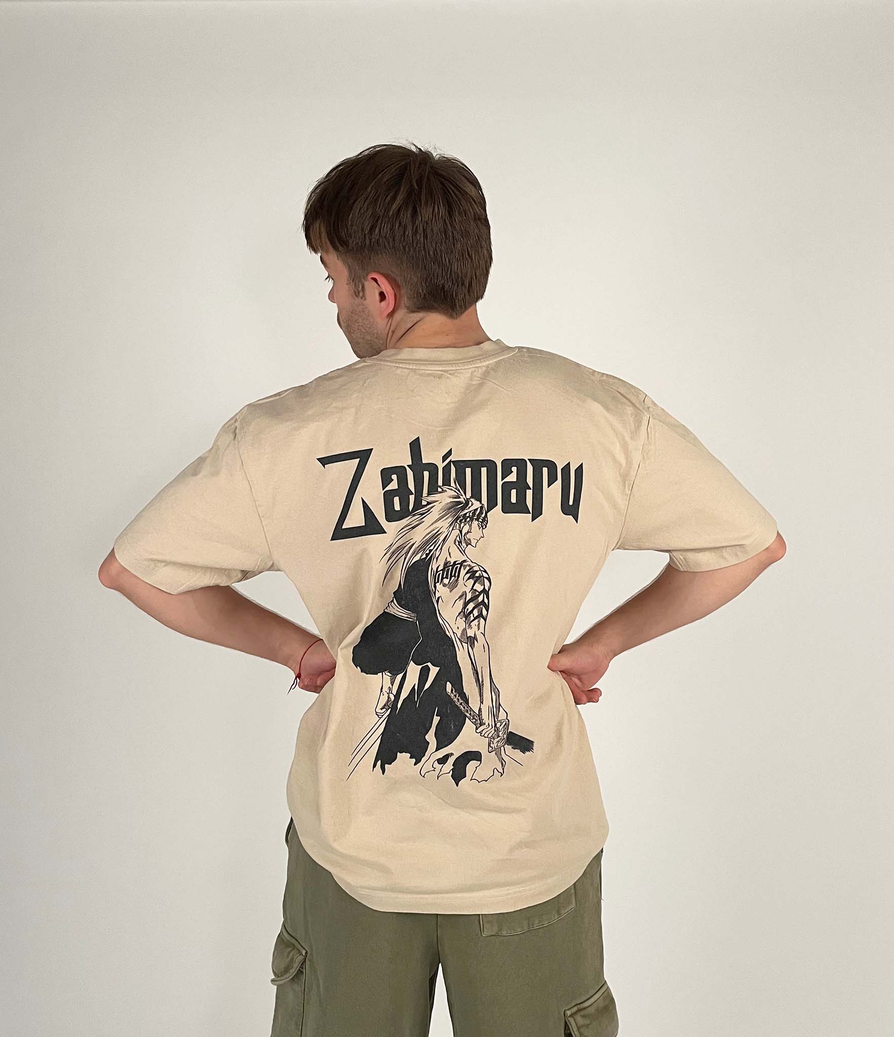 An oversized tshirt inspired by Renji from Bleach. Anime Pump Cover for the gym with Zabimaru text and Renji from Bleach. Male model back design
