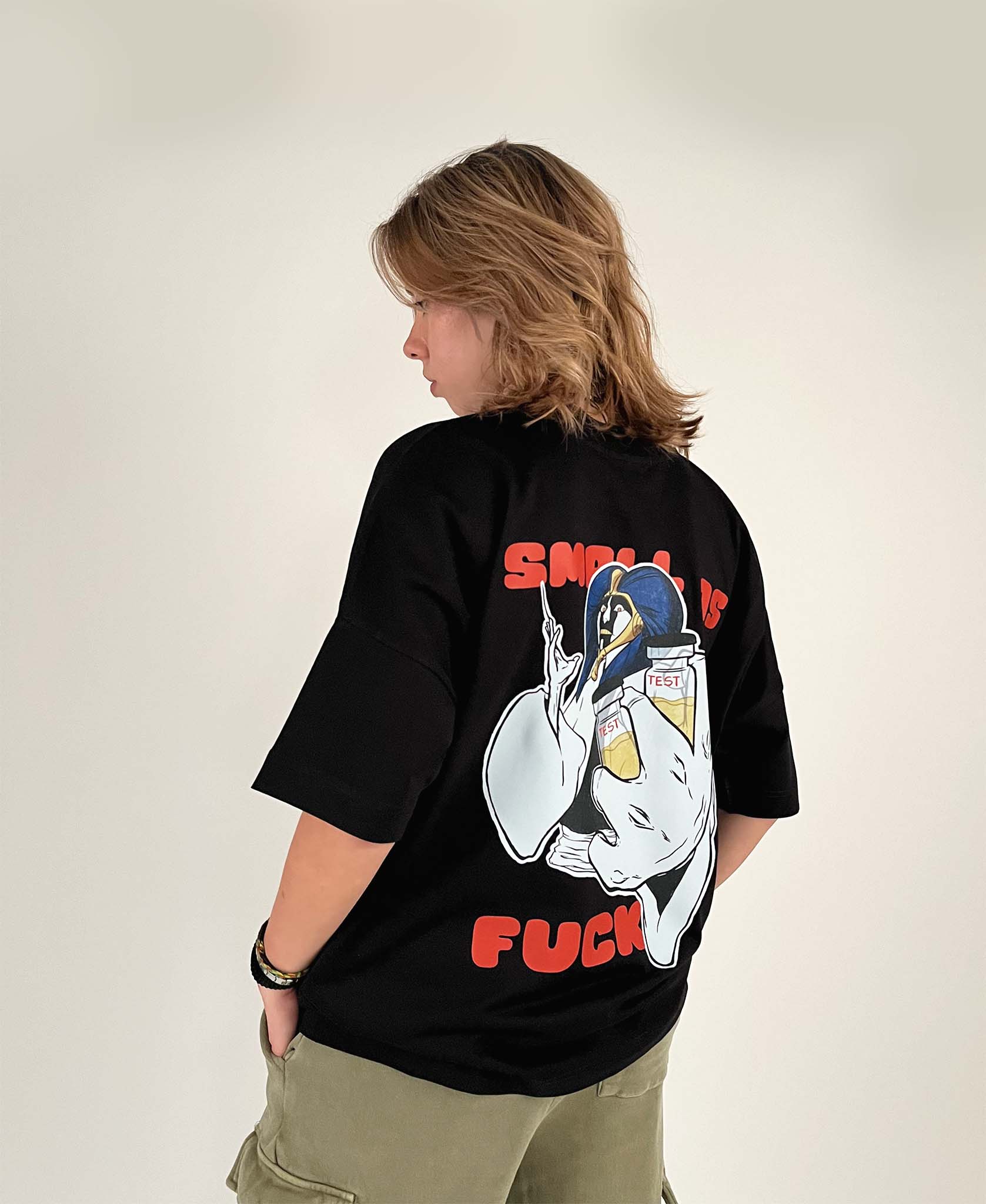 An oversized tshirt inspired by Mayuri from Bleach. Anime Pump Cover for the gym with Small as F text and Mayuri from Bleach. Female model 3/4 design