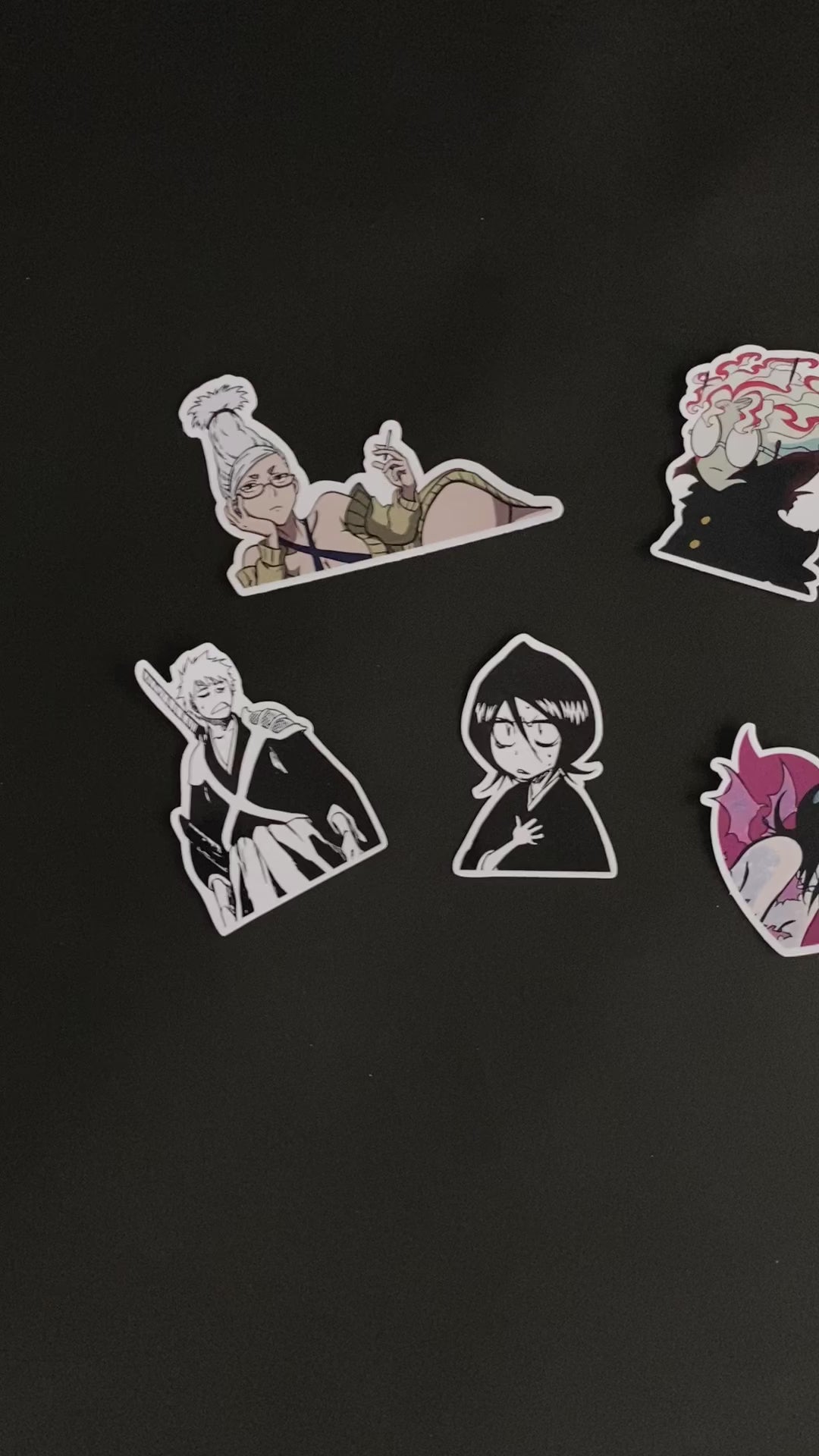 A video showcasing a couple of the glossy vinyl stickers