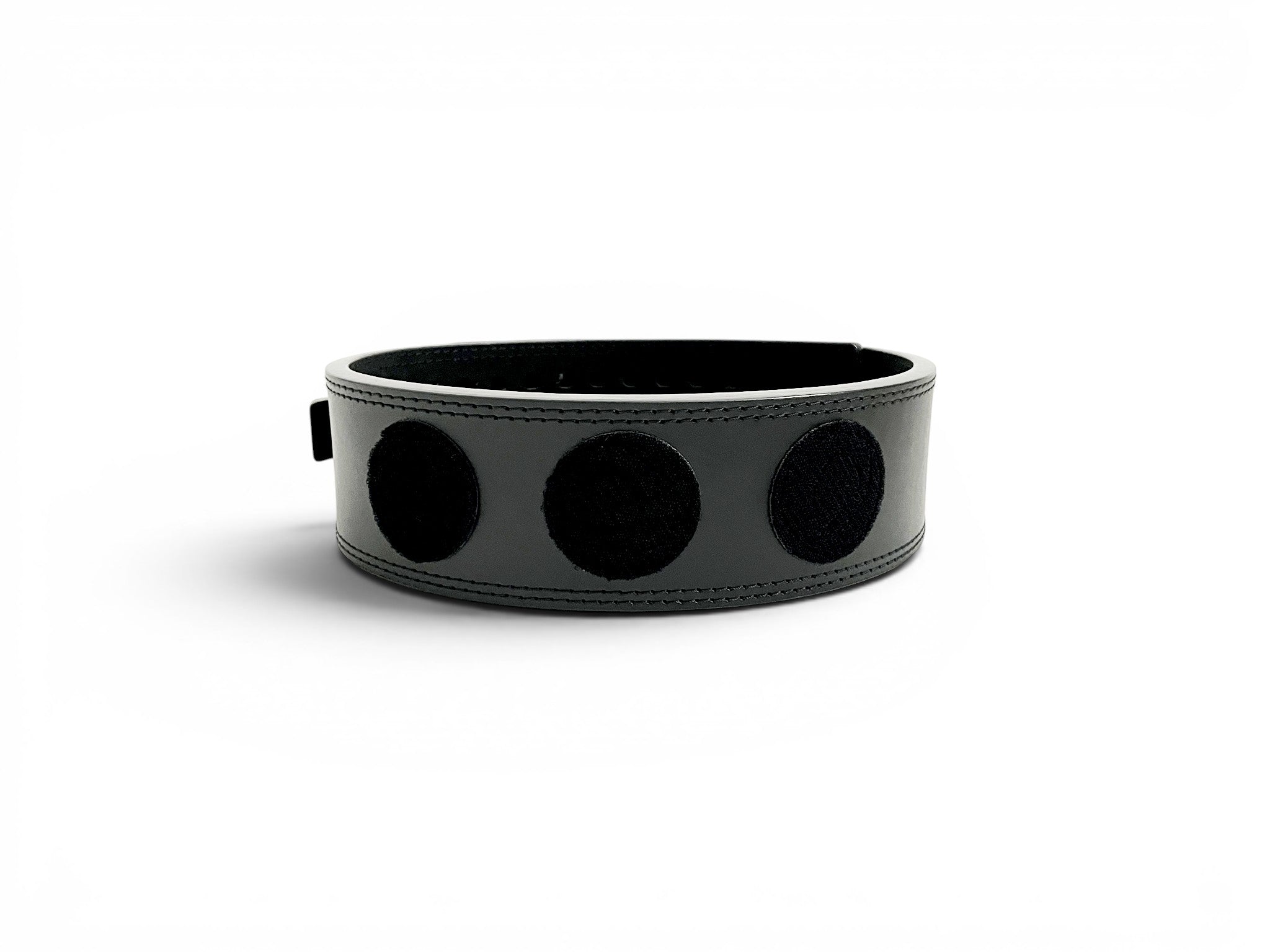 An anime powerlifting belt, 13mm thick and 4 inch wide. Featuring 4 places for embroidery patches. This picture shows the belt without any patches placed. The photo is back view of the belt.