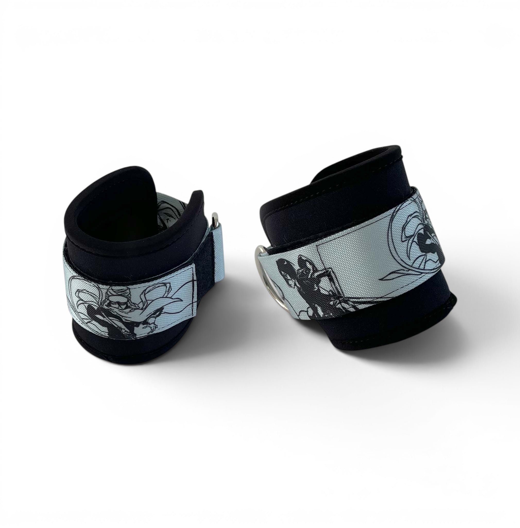 A pair of cable cuffs inspired by Rukia from Bleach. Top-down view