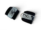 A pair of cable cuffs inspired by Rukia from Bleach