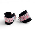 A pair of cable cuffs inspired by Hello Kitty from Sanrio
