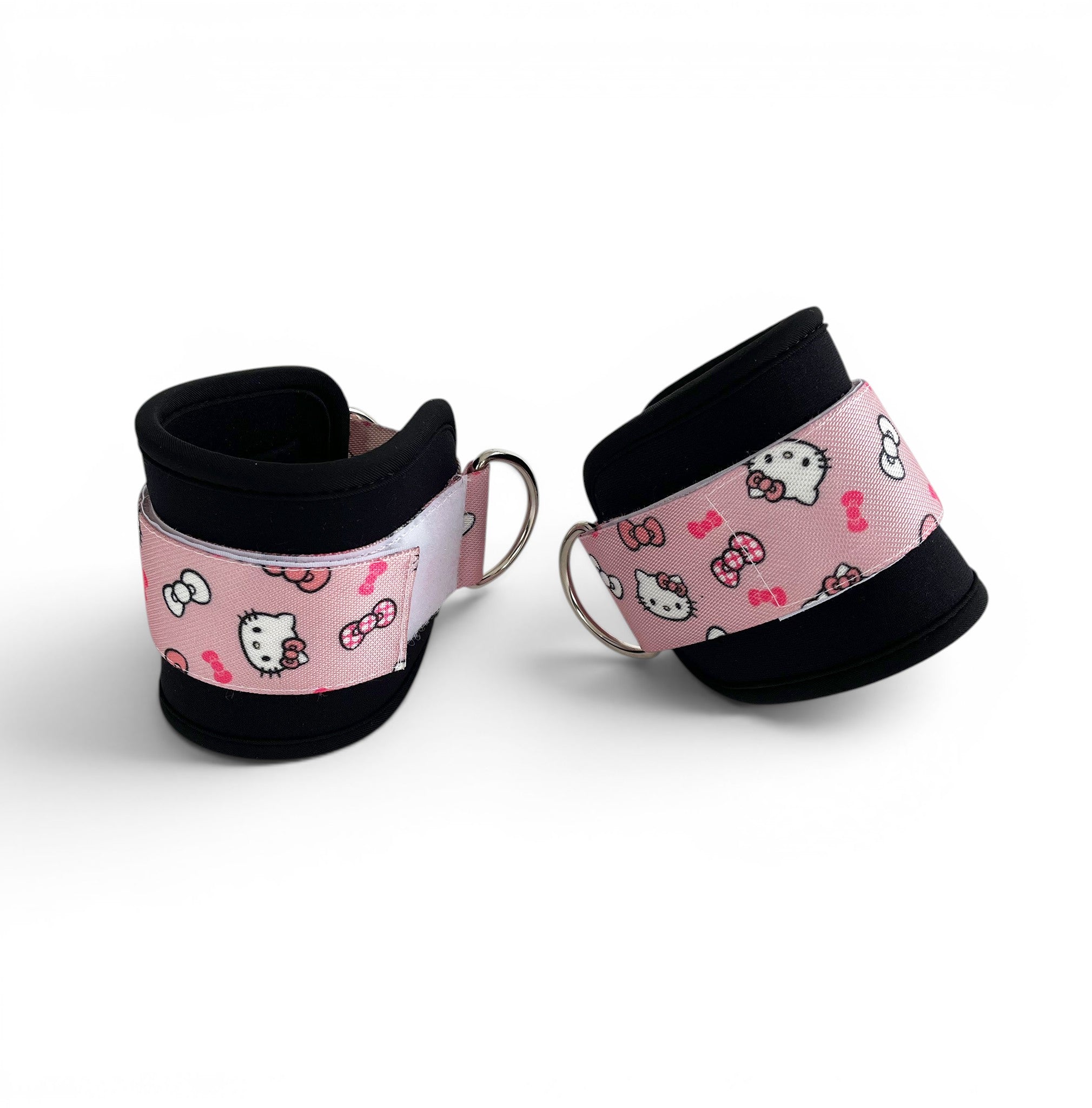 A pair of cable cuffs inspired by Hello Kitty from Sanrio