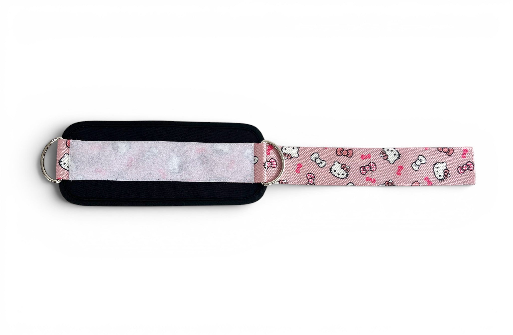 A pair of cable cuffs inspired by Hello Kitty from Sanrio