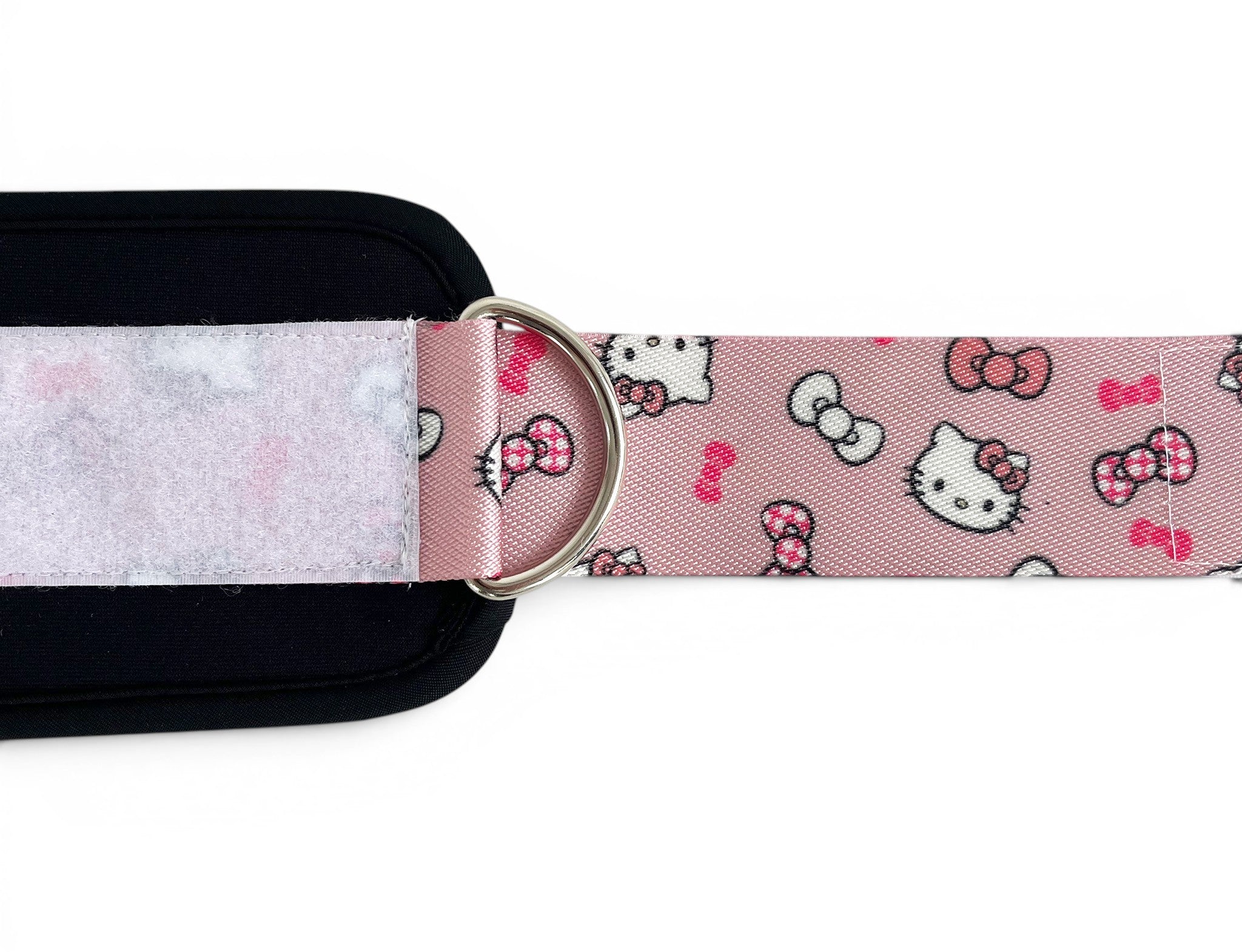 A pair of cable cuffs inspired by Hello Kitty from Sanrio. Detail shot