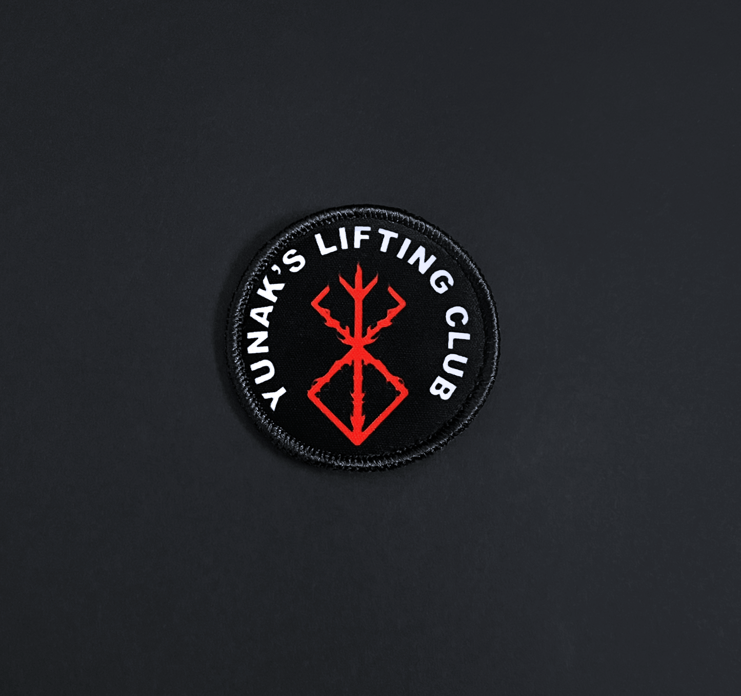 A top down view of the Yunak's Lifting Club embroidery patch