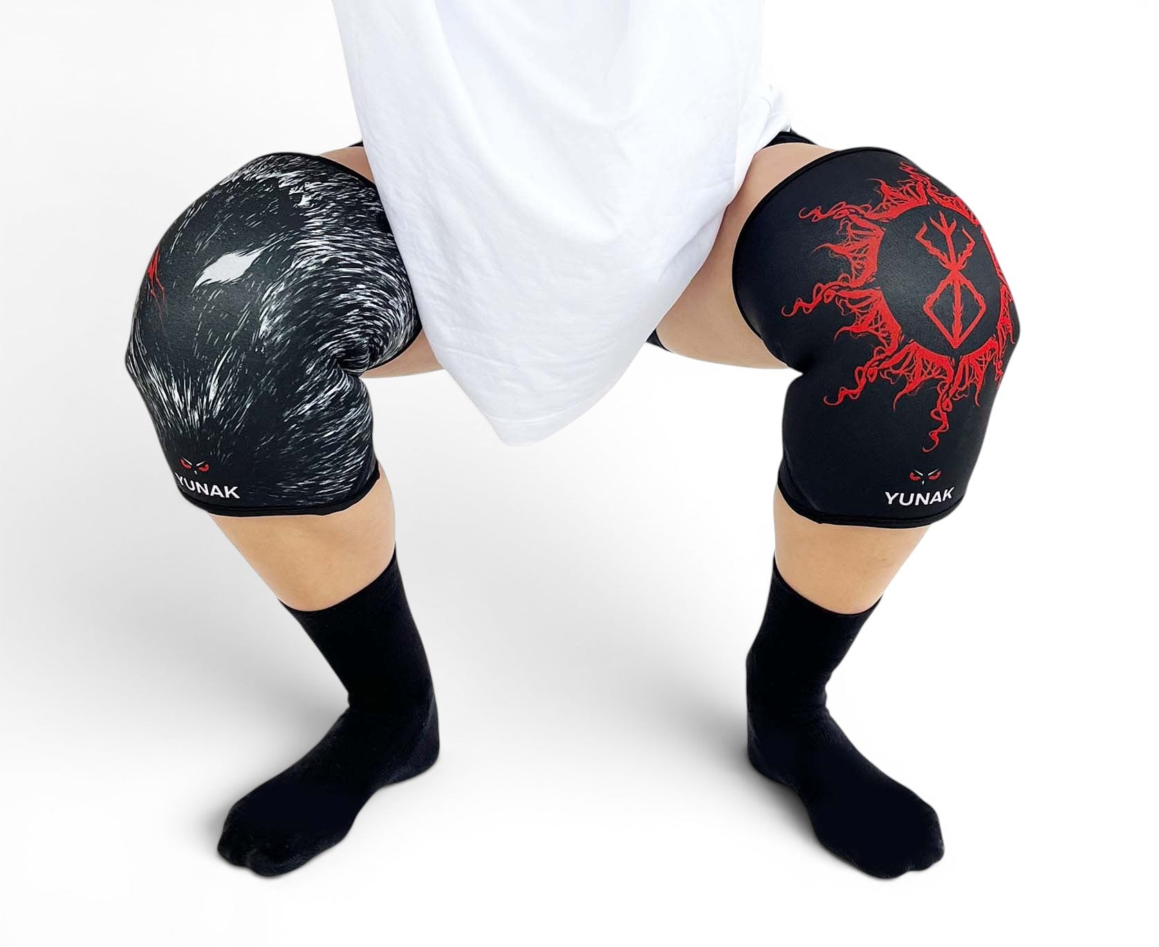 7mm thick knee sleeves inspired by Guts from Berserk. Anime knee sleeves for the gym with Guts anime design for weightlifting. Detail shot in squatting position