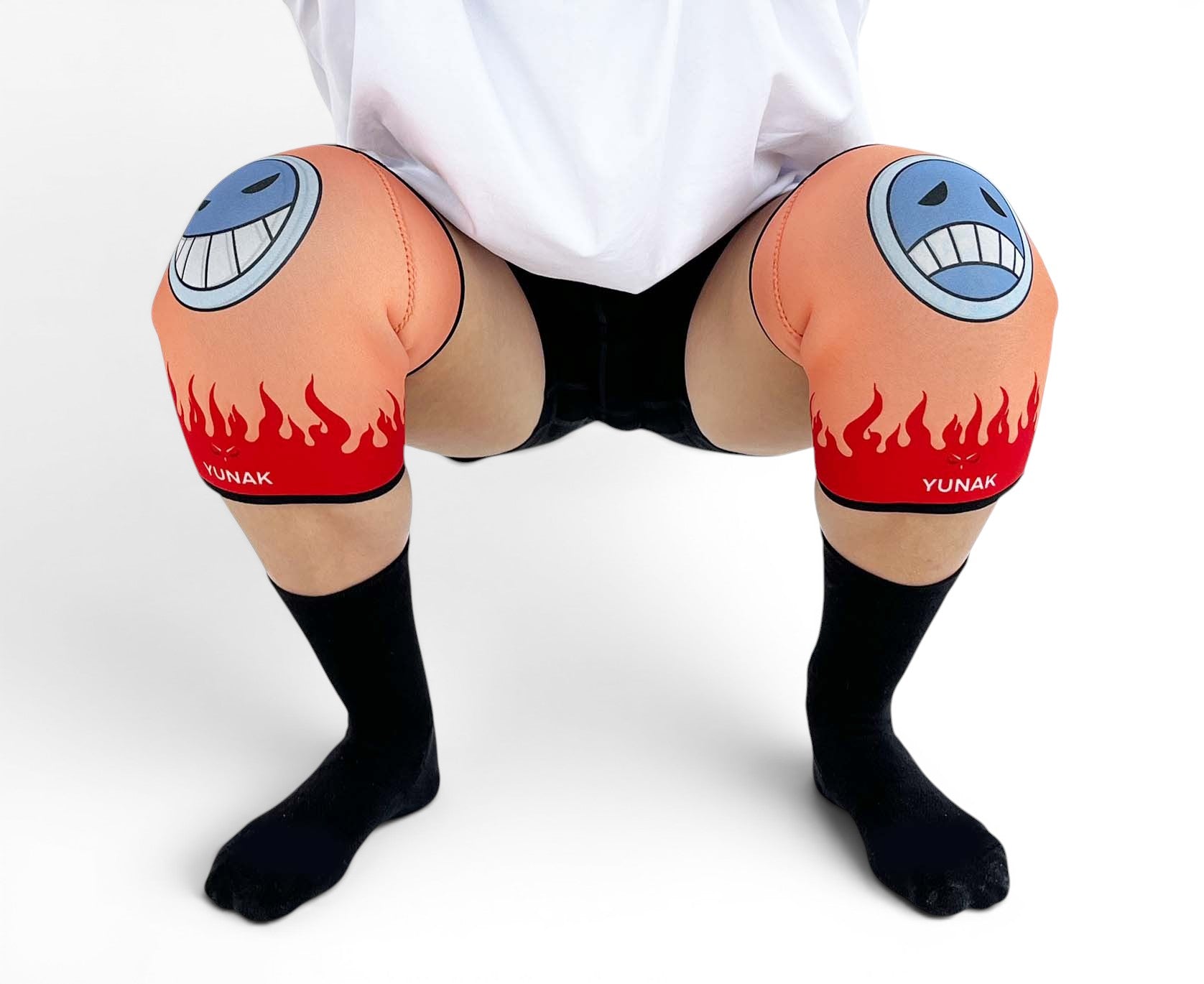 7mm thick knee sleeves inspired by Ace from One Piece. Anime knee sleeves for the gym with Ace anime design for weightlifting. Detail shot in squatting position