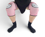 7mm thick knee sleeves inspired by Hello Kitty from Sanrio. Anime knee sleeves for the gym with Hello Kitty anime design for weightlifting. Detail shot in squatting position