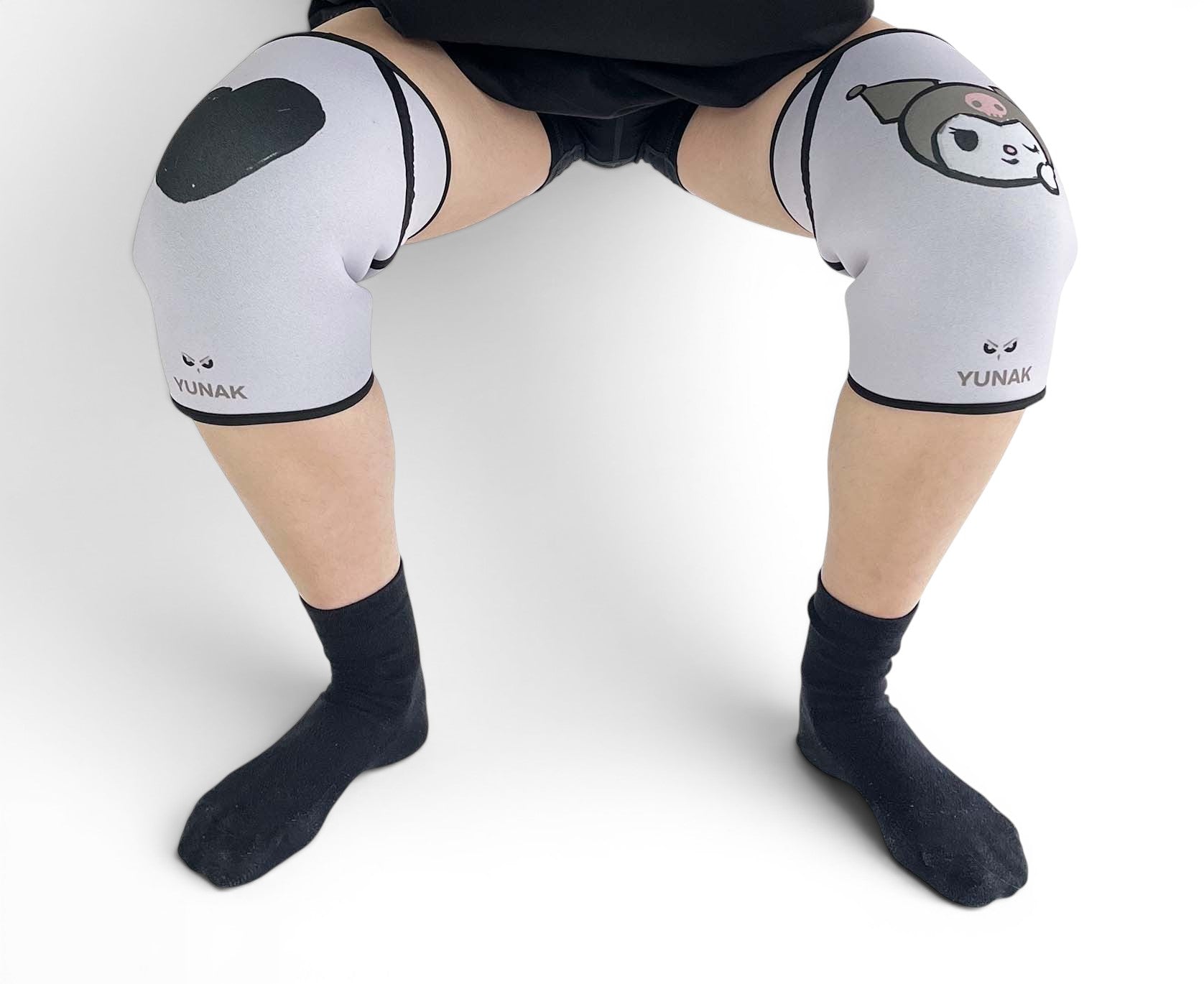 7mm thick knee sleeves inspired by Kuromi from Sanrio. Anime knee sleeves for the gym with Hello Kitty anime design for weightlifting. Detail shot in squatting position