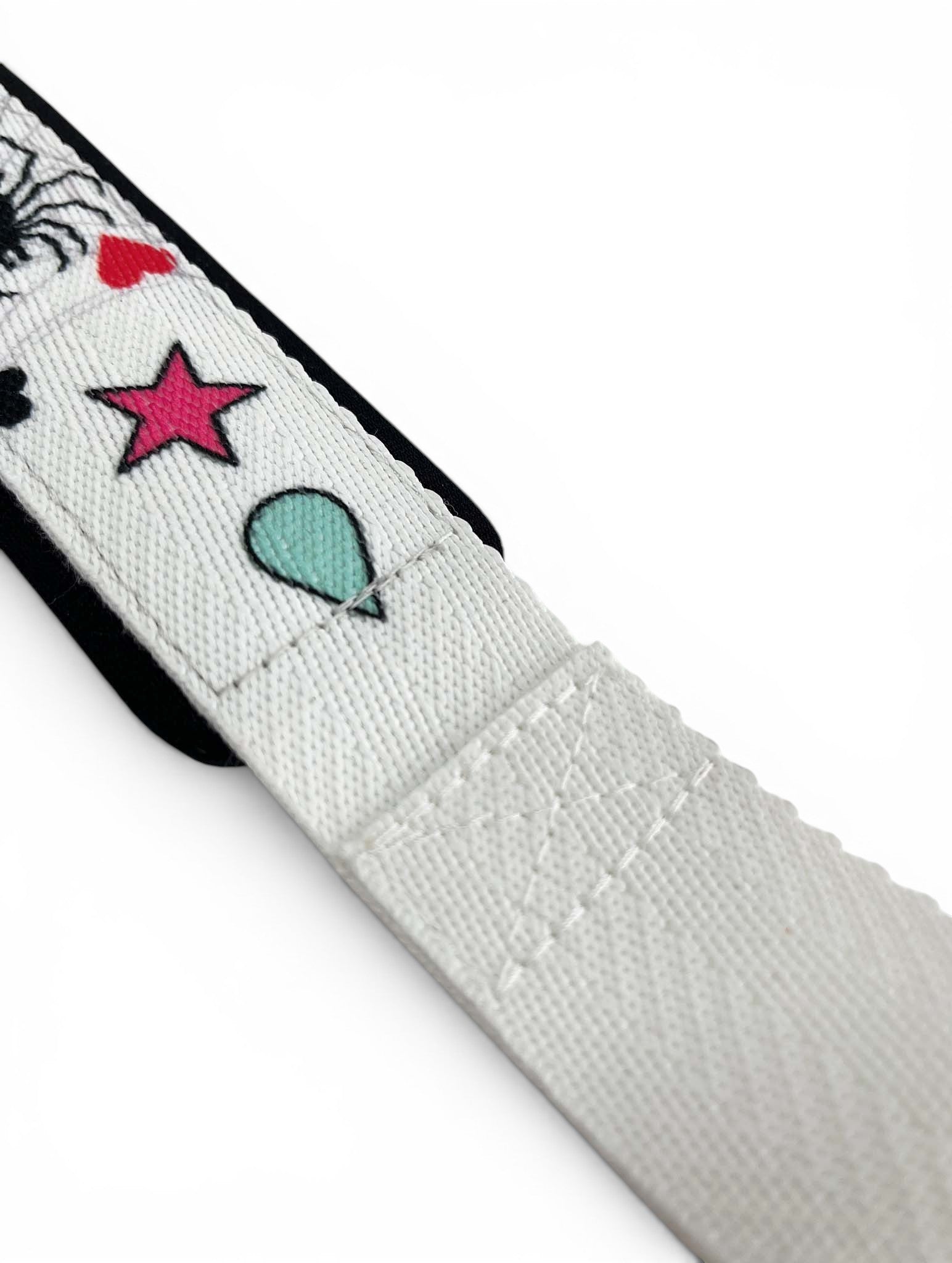 Anime lifting straps inspired by Hisoka from HunterxHunter. Anime lifting gear for the gym. Details shot