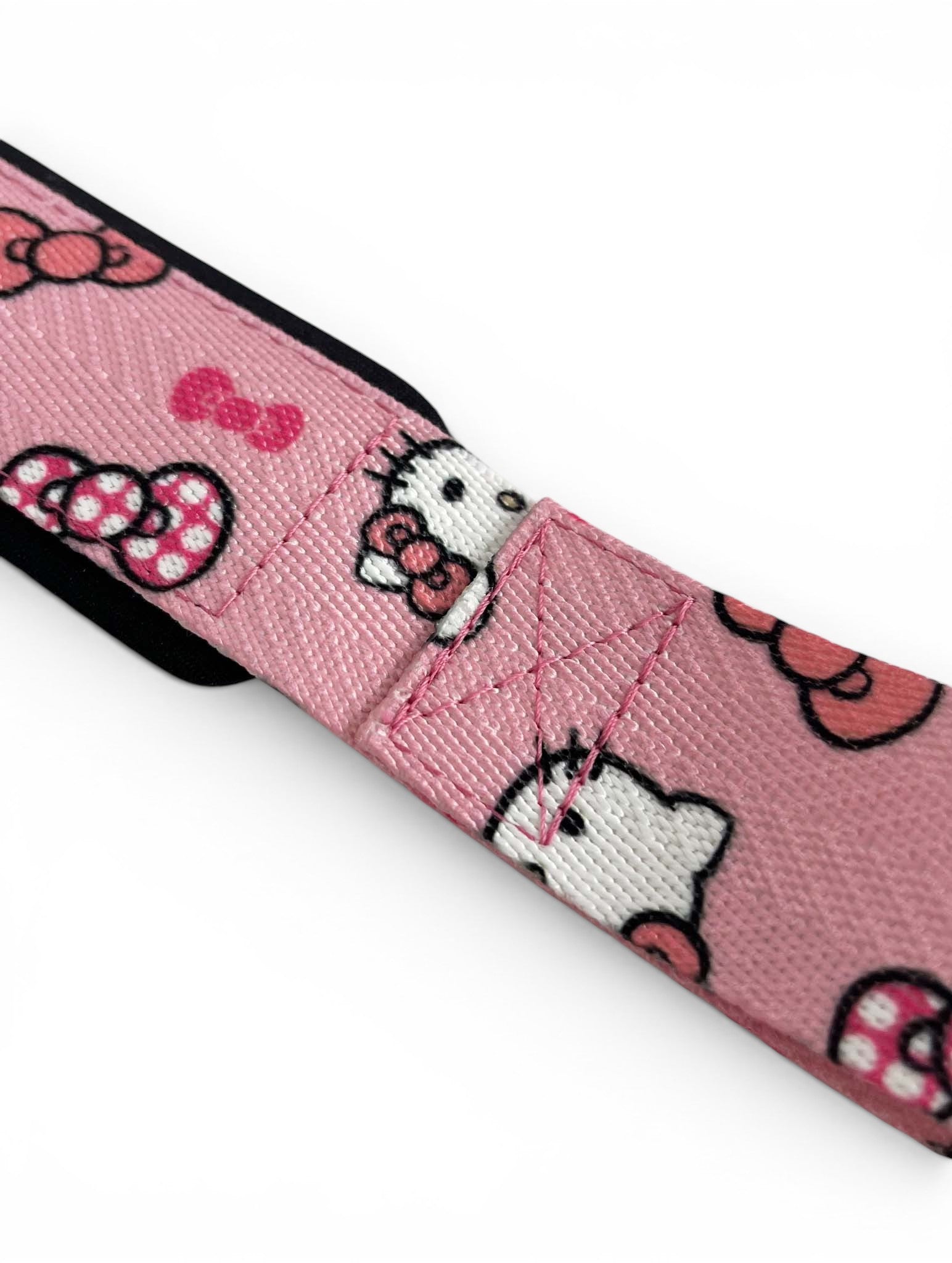 Anime lifting straps inspired by Hello Kitty from Sanrio. Anime lifting gear for the gym. Details shot