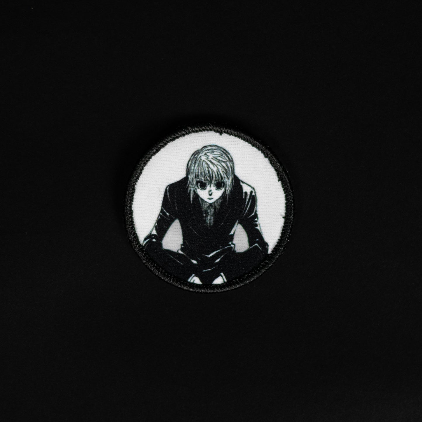 A top down view of the Kurapika embroidery patch.