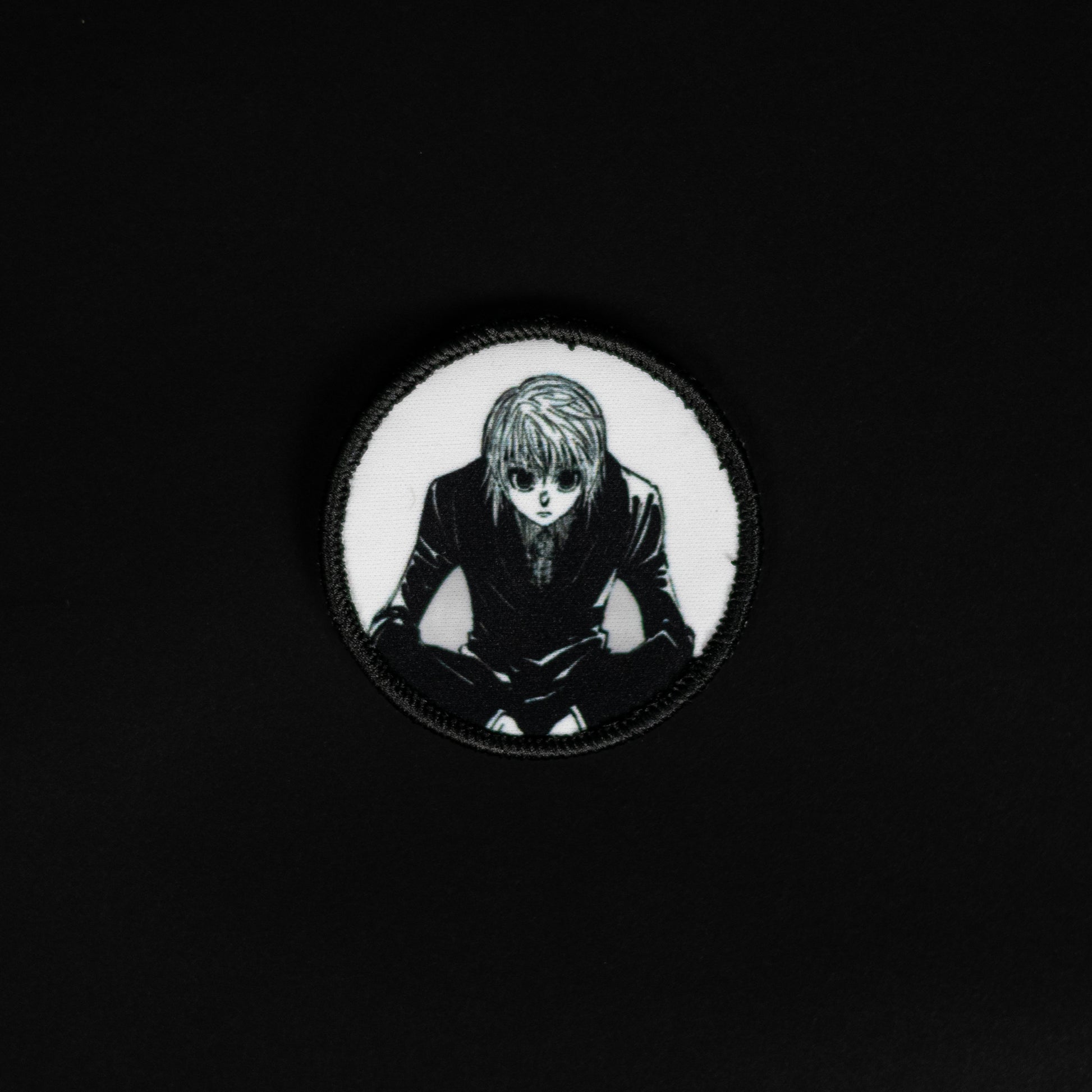A top down view of the Kurapika embroidery patch.