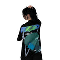 Person wearing a black t-shirt with graphic design of Kurapika from HunterxHunter on the back, standing against a white background