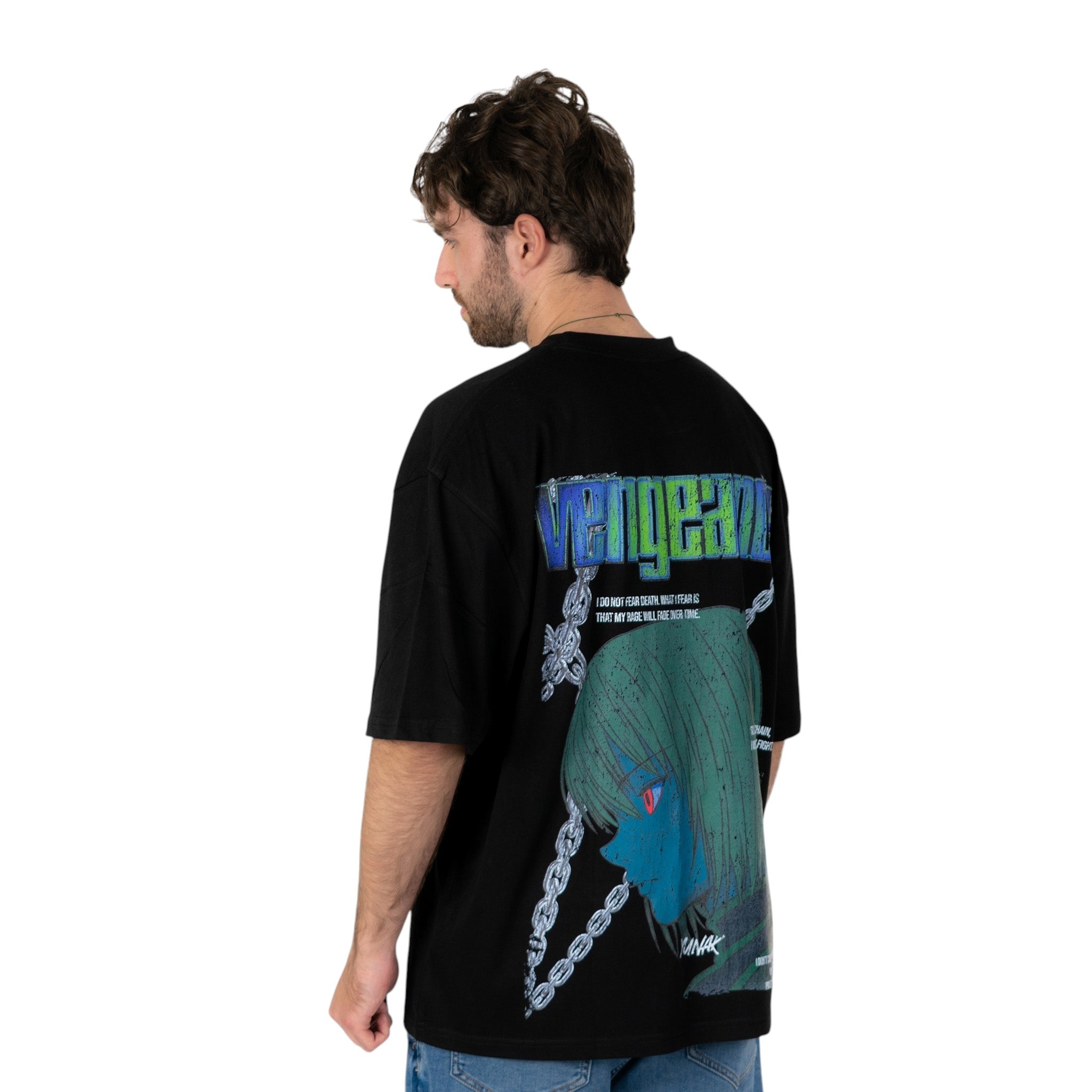 Person wearing a black t-shirt with graphic design of Kurapika from HunterxHunter on the back, standing against a white background