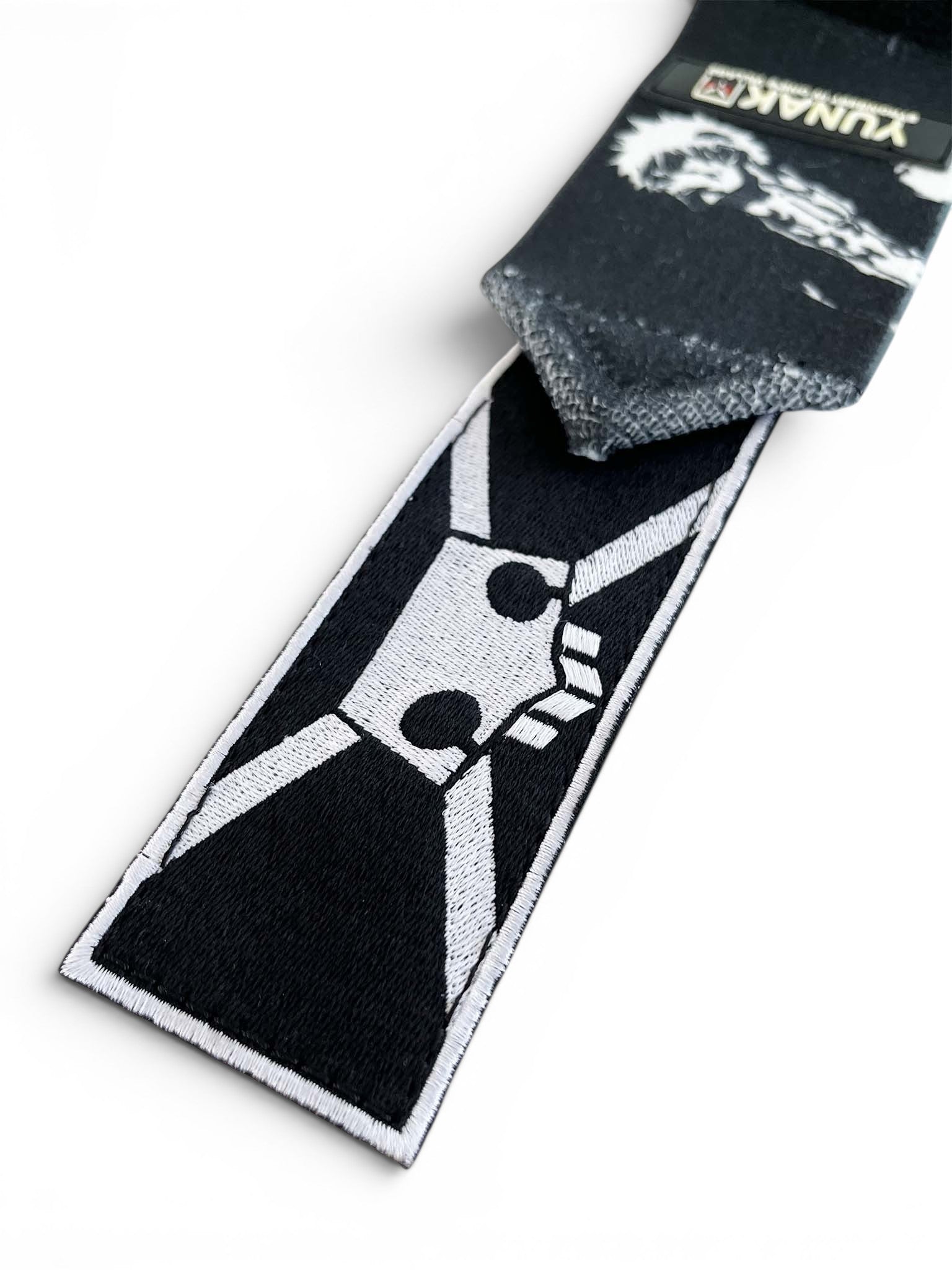 Embroidered anime wrist wraps inspired by Ichigo from Bleach. Anime lifting wraps for the gym. Close detail shot