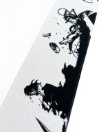 Embroidered anime wrist wraps inspired by Ichigo from Bleach. Anime lifting wraps for the gym. Close detail shot