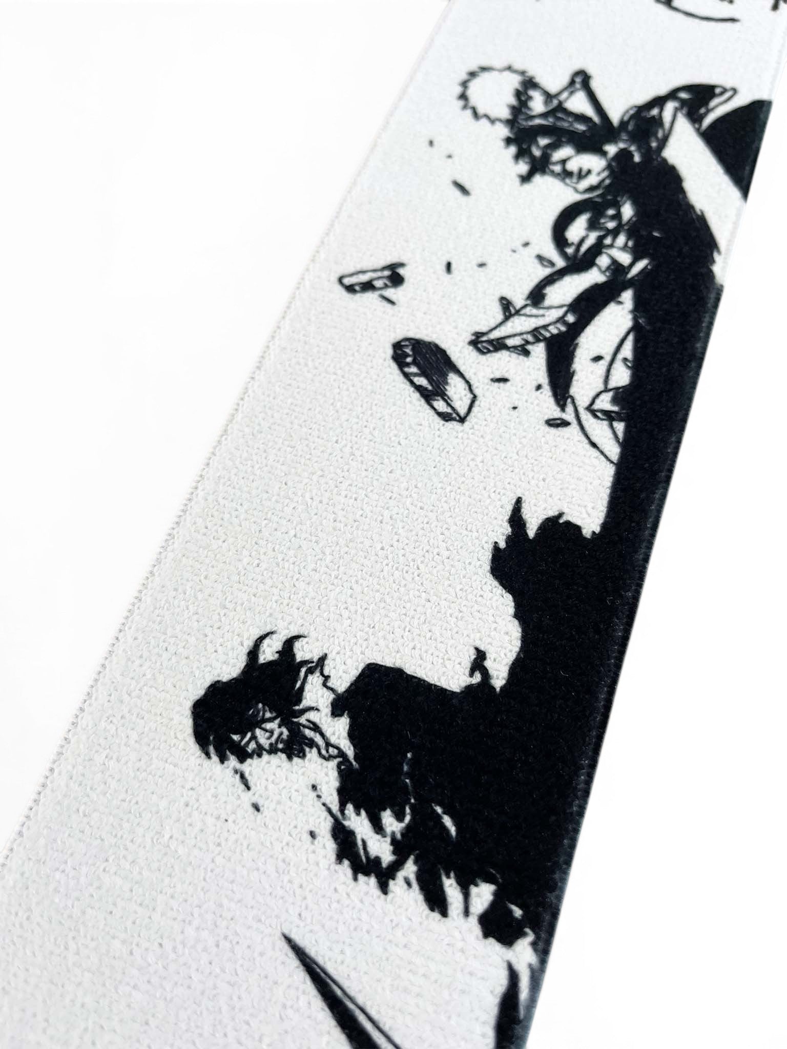 Embroidered anime wrist wraps inspired by Ichigo from Bleach. Anime lifting wraps for the gym. Close detail shot