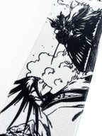 Embroidered anime wrist wraps inspired by Kenpachi Zaraki from Bleach. Anime lifting wraps for the gym. Close detail shot