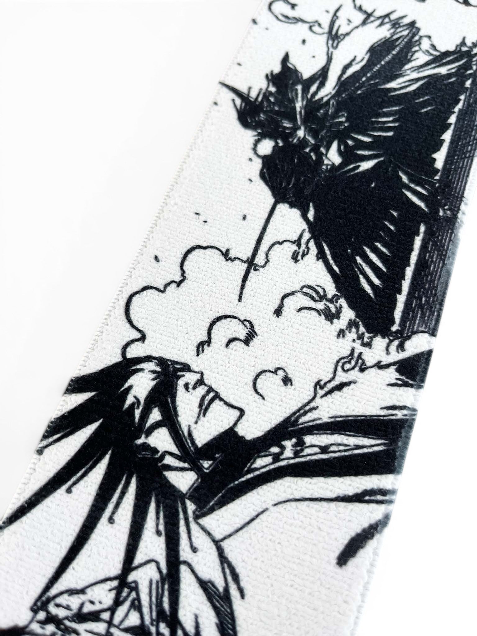 Embroidered anime wrist wraps inspired by Kenpachi Zaraki from Bleach. Anime lifting wraps for the gym. Close detail shot