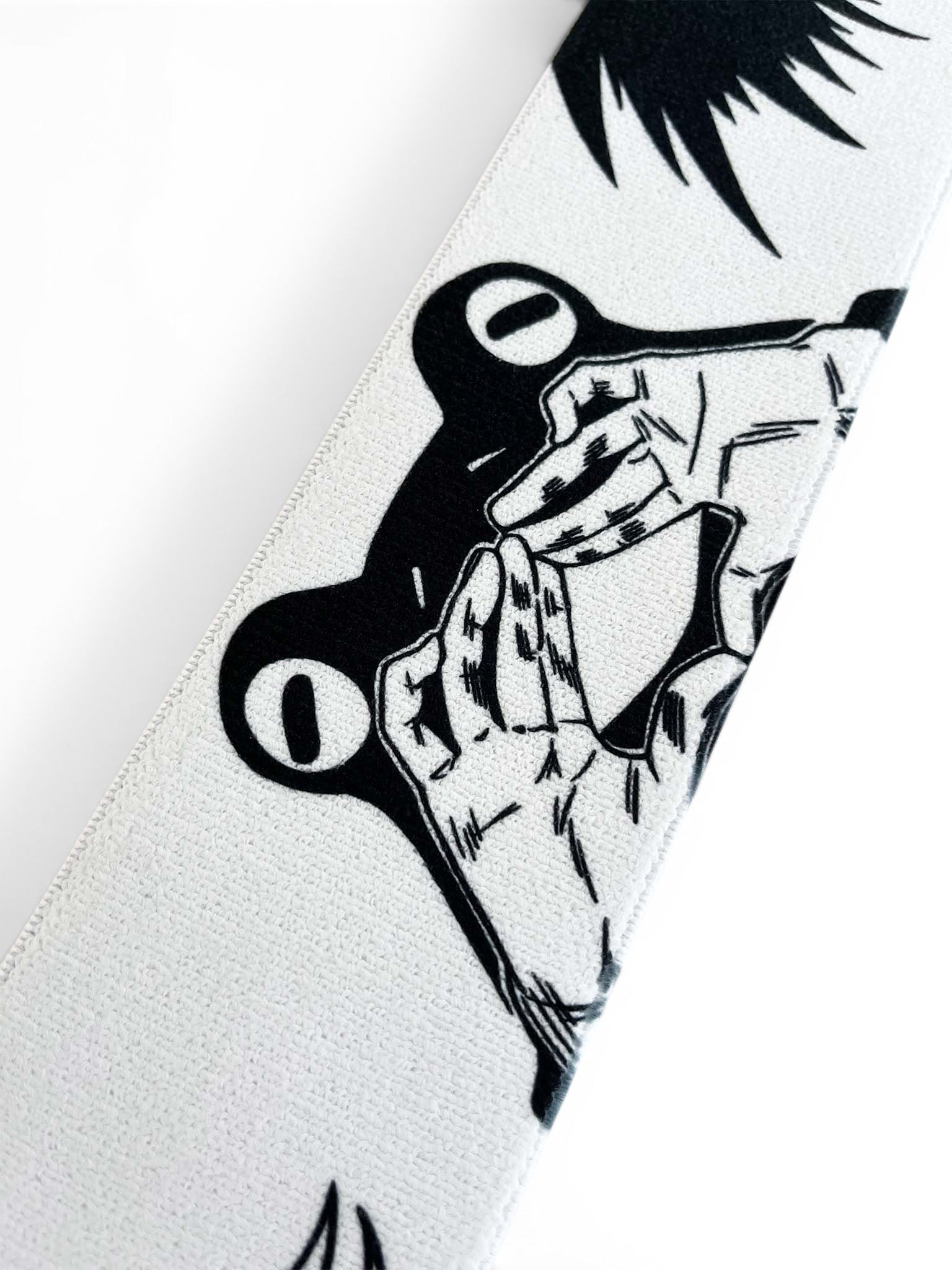 Anime wrist wraps inspired by Megumi from Jujutsu Kaisen. Anime lifting wraps for the gym with jjk shikigami anime design for weightlifting. Close detail shot