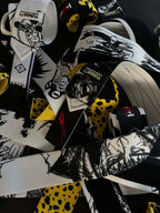 A mystery bundle containing one random pair of wrist wraps with anime inspired design. Picture shows a number of the anime wrist wraps that can be inside the package