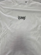 Person wearing a black t-shirt with graphic design of Yuji Itadori from Jujutsu Kaisen on the back, standing against a white background